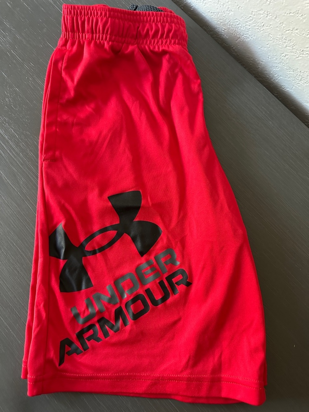 Under Armour Red Performance Shorts with Black Logo